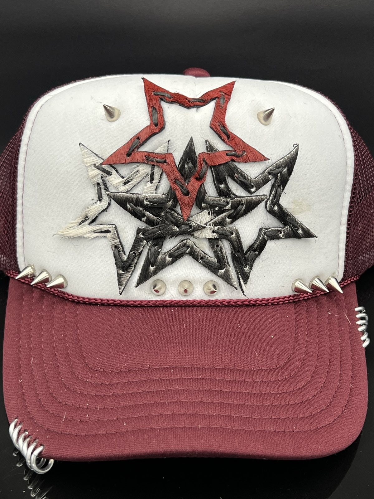 Studded star trucker